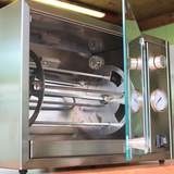 Girarrosto elettrico Marmolada RZeta — vista frontale con porte in vetro e termometri analogici