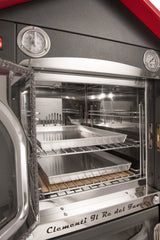 Forno a legna Clementi Smile antracite — dettaglio griglie interne e bocca forno con alogena